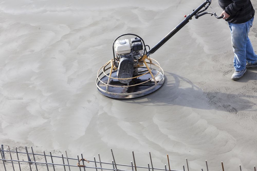 an electric concrete scraper is used to create a smoother finish