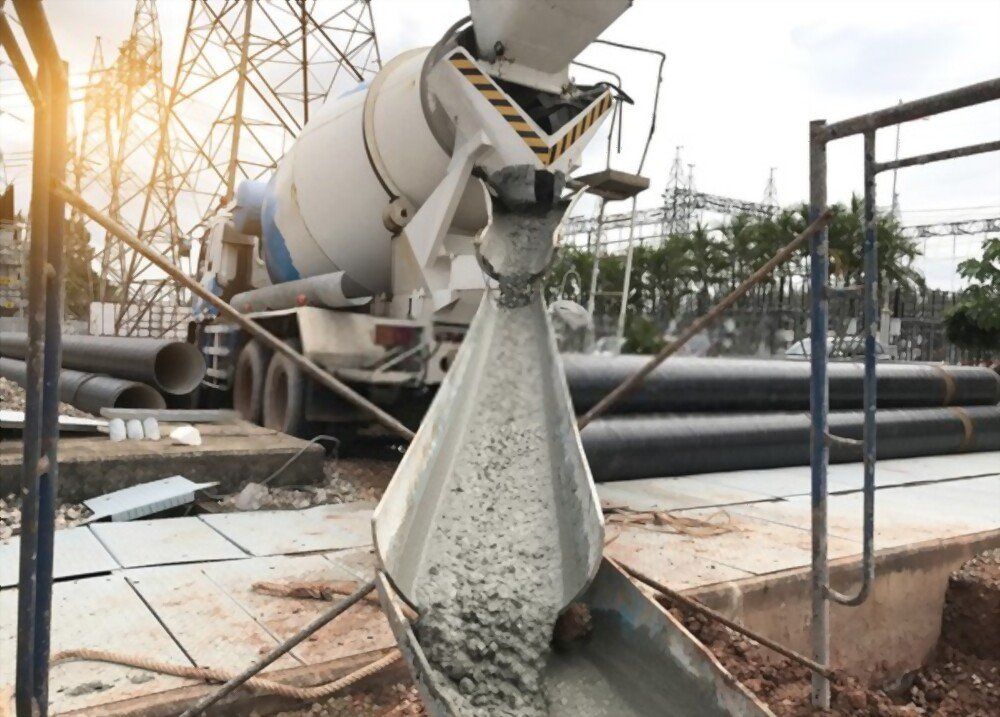 concrete mixture is poured into the frame through a specialized machine