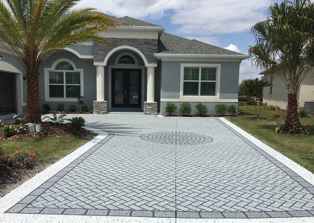 stenciled concrete driveway in Stuart FL designed and installed by Palm Beach Stamped Concrete decorative concrete experts
