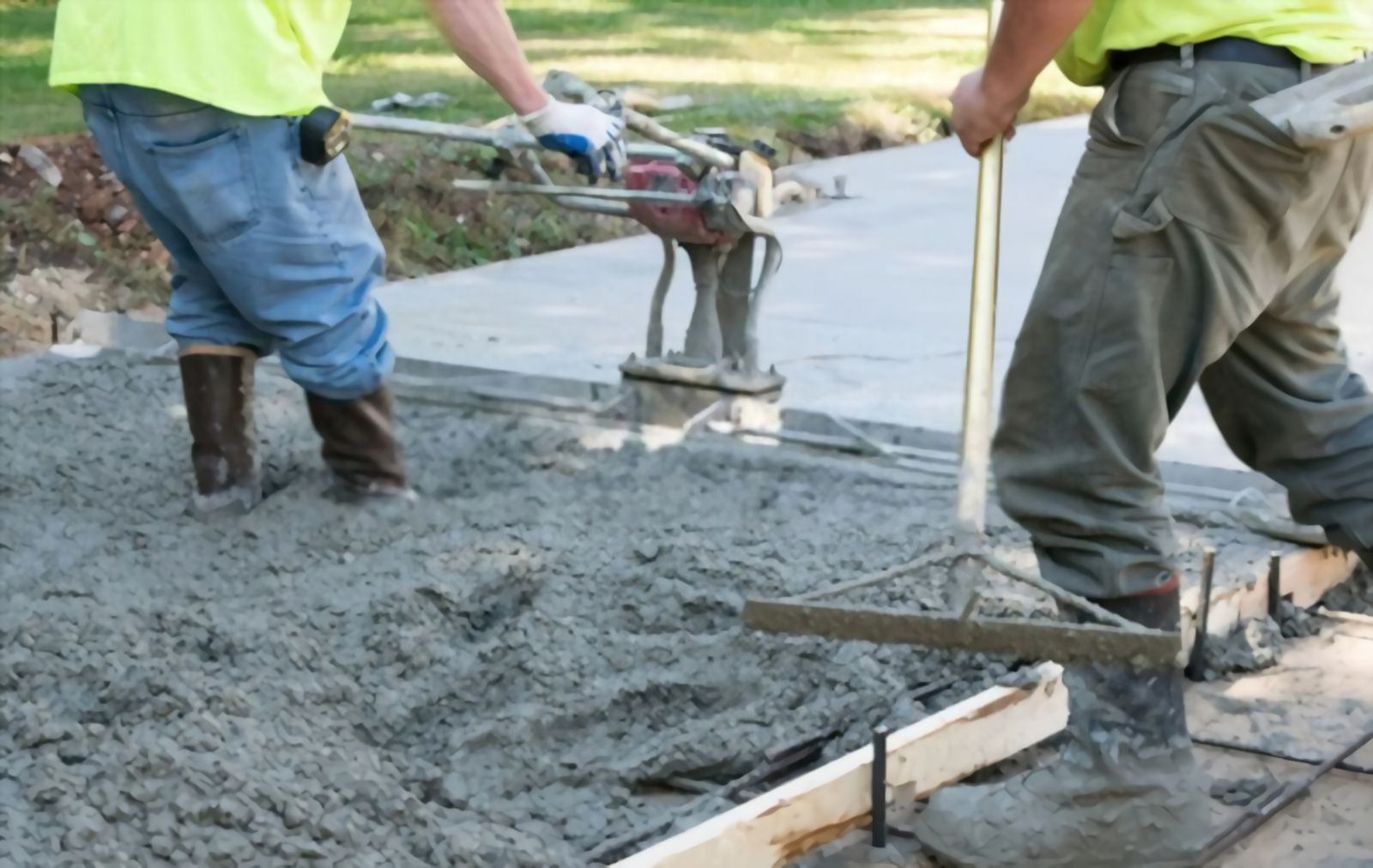 Palm Beach Stamped Concrete pros installing plain concrete driveway in Stuart FL