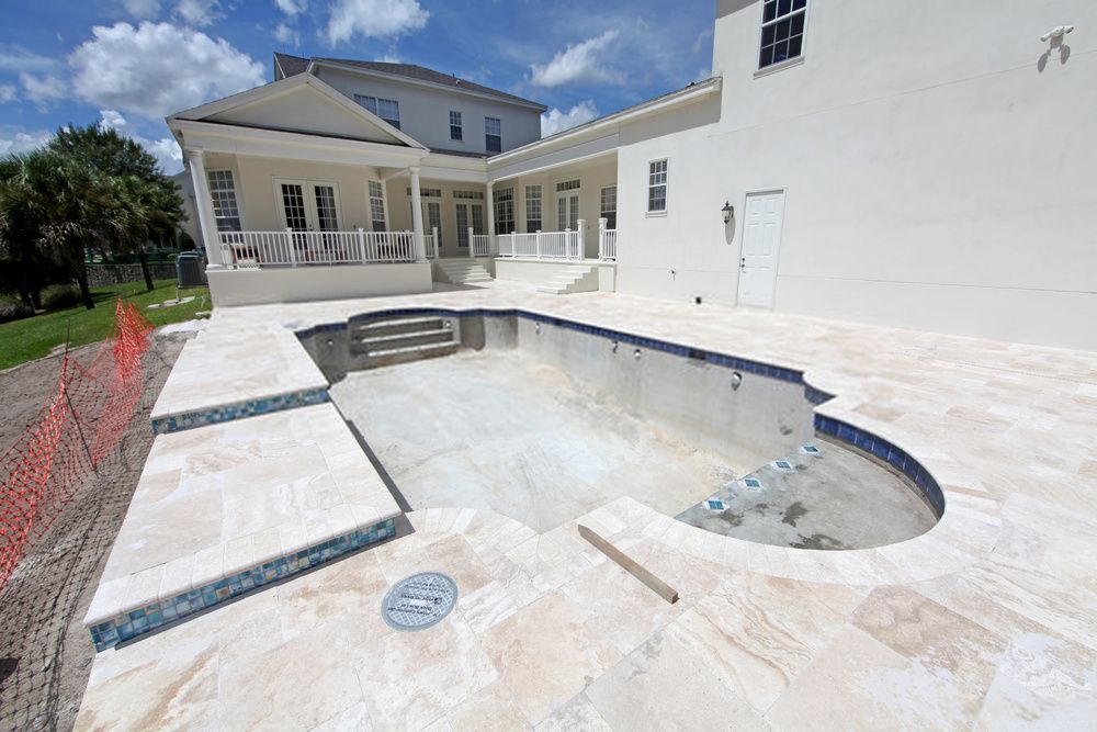 stamped concrete pool designed and installed by Palm Beach Stamped Concrete pros in a Jupiter, FL property